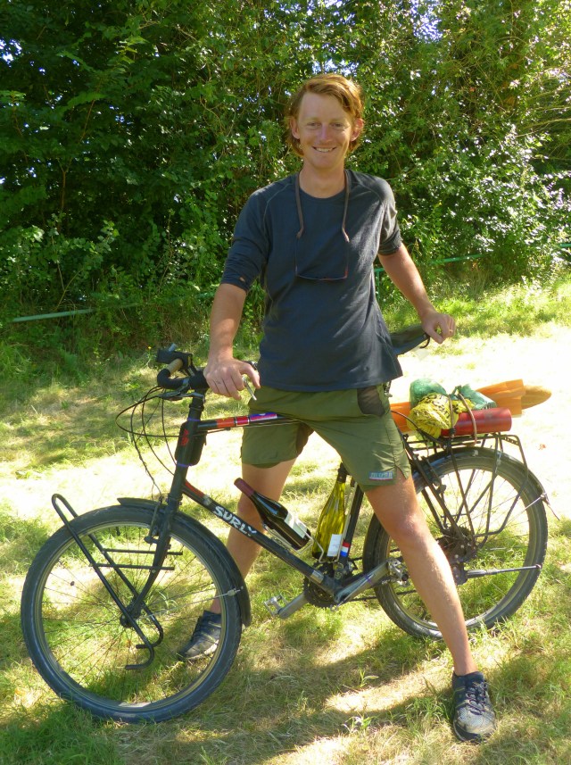 Chan using his bike to carry proper items